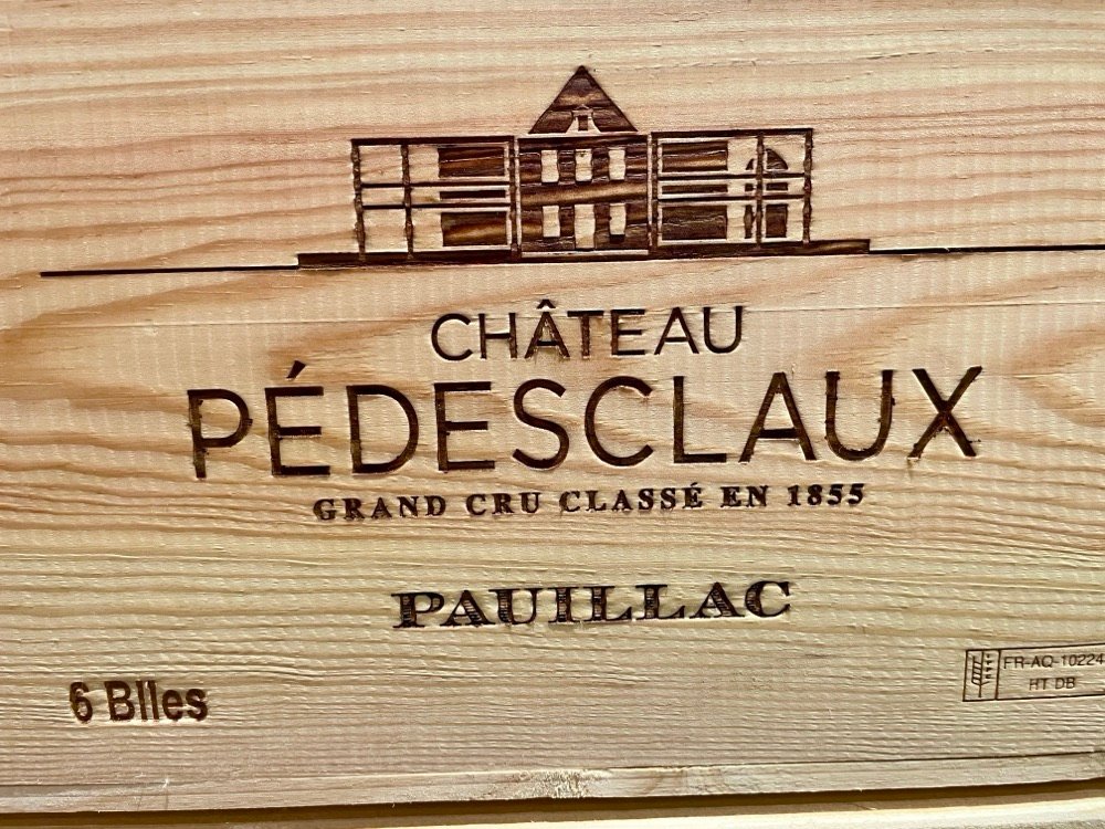 A wooden case of Château Pédesclaux