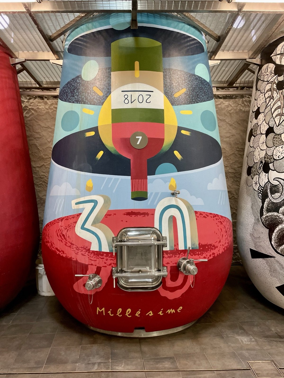 A hand-painted vat celebrating the 30th vintage in a Pessac-Léognan cellar