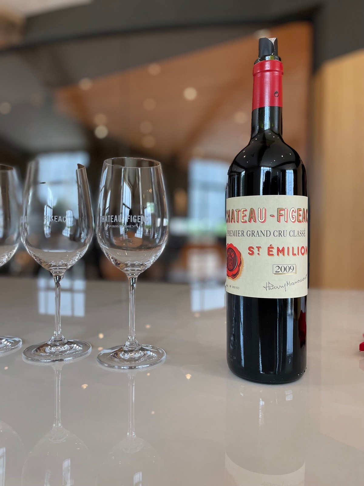 A bottle of Château Figeac, Premier Grand Cru Classé, ready for the tasting